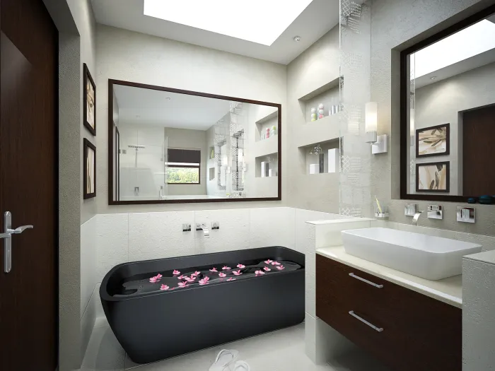 Маленькая светлая ванная комната, где ярким пятном выступает тёмно-серая ванна.